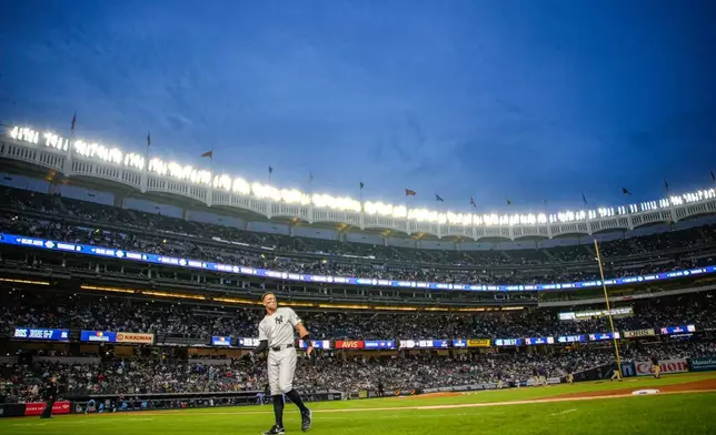 New York Yankees Aaron Judge (99), exits the field after been out in first base during the third inning of a baseball game against the Toronto Blue Jays, Thursday, May 21, 2026. in New York. (AP Photo/Eduardo Munoz Alvarez)