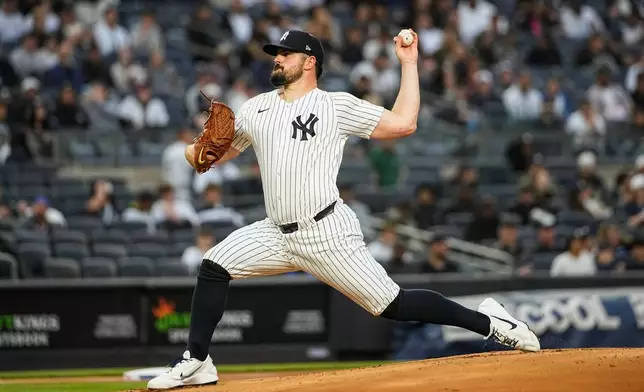 New York Yankees pitcher Carlos Rodon (55), throws during the first inning of a baseball game against the Toronto Blue Jays, Thursday, May 21, 2026. in New York. (AP Photo/Eduardo Munoz Alvarez)