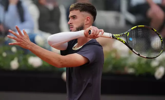 Croatia's Dino Prizmic returns the ball to Serbia's Novak Djokovic during their match at the Italian Open tennis tournament, in Rome, Friday, May 8, 2026. (AP Photo/Andrew Medichini)