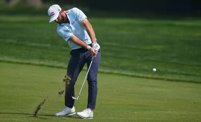 Cameron Young hits from the first fairway during a PGA Championship golf tournament practice round at Aronimink Golf Club, Wednesday, May 13, 2026, in Newtown Square, PA. (AP Photo/Frank Franklin II)