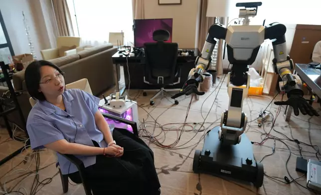 Hyemin Cho, RX Consultant at RLWRLD, speaks during an interview with The Associated Press in Seoul, South Korea, Tuesday, April 28, 2026. (AP Photo/Lee Jin-man)
