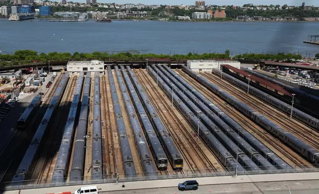 Long Island Rail Road trains sit at the West Side Yard on the first day of a Long Island Rail Road workers' strike, Saturday, May 16, 2026, in New York. (AP Photo/Heather Khalifa)