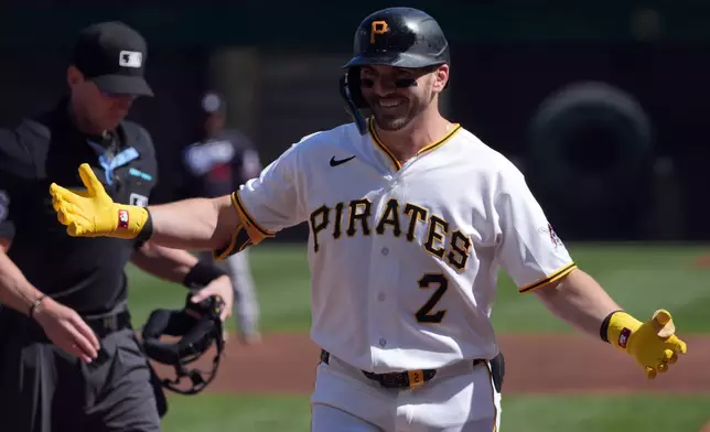 Pittsburgh Pirates' Spencer Horwitz (2) celebrates as he heads back to the dugout after his home run off of Minnesota Twins pitcher Bailey Ober in the first inning of a baseball game in Pittsburgh, Saturday, May 30, 2026. (AP Photo/Tom E. Puskar)