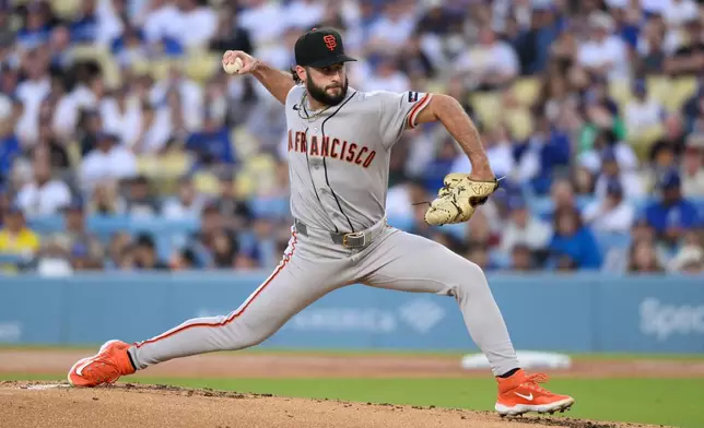 San Francisco Giants starting pitcher Trevor McDonald delivers during the first inning of a baseball game against the Los Angeles Dodgers in Los Angeles, Monday, May 11, 2026. (AP Photo/Kyusung Gong)