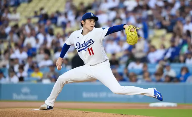 Los Angeles Dodgers starting pitcher Roki Sasaki delivers during the first inning of a baseball game against the San Francisco Giants in Los Angeles, Monday, May 11, 2026. (AP Photo/Kyusung Gong)