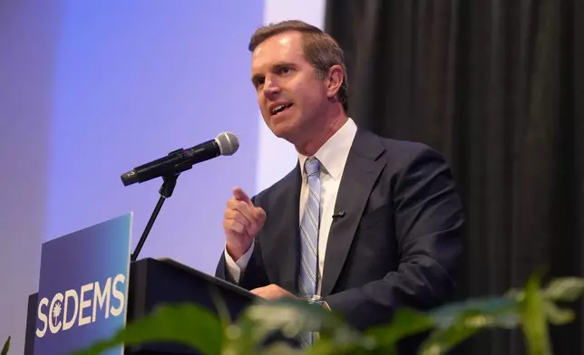 Democratic Gov. Andy Beshear of Kentucky speaks to attendees at the South Carolina Democratic Party's Blue Palmetto Dinner on Friday, May 29, 2026, in Columbia S.C. (AP Photo/Meg Kinnard)