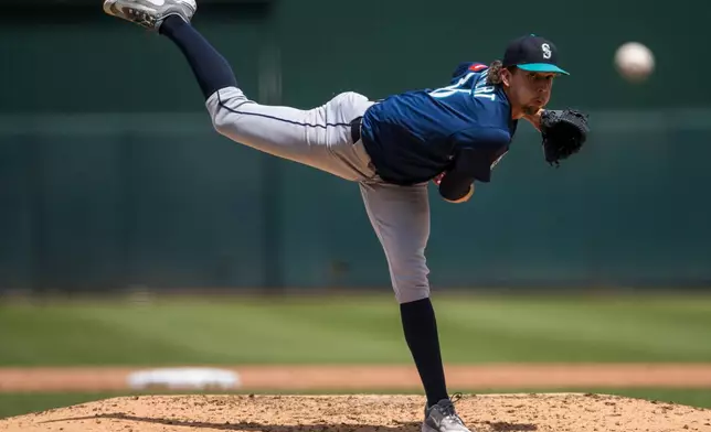 Seattle Mariners pitcher Logan Gilbert (36) throws during the fifth inning of a baseball game against the Athletics in West Sacramento, Calif., Wednesday, May 27, 2026. (AP Photo/Nic Coury)