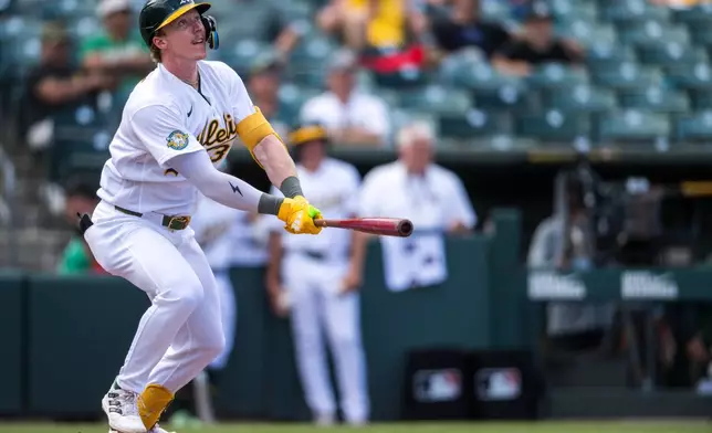 Athletics' Henry Bolte hits during the ninth inning of a baseball game against the Seattle Mariners in West Sacramento, Calif., Wednesday, May 27, 2026. (AP Photo/Nic Coury)