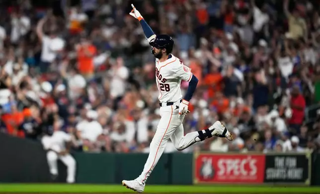 Houston Astros' Braden Shewmake runs the bases after hitting a home run during the third inning of a baseball game against the Los Angeles Dodgers in Houston, Tuesday, May 5, 2026. (AP Photo/Ashley Landis)