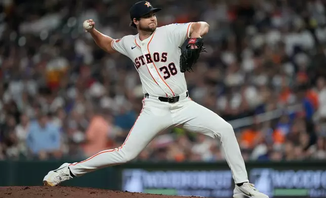 Houston Astros starting pitcher Peter Lambert throws during the third inning of a baseball game against the Los Angeles Dodgers in Houston, Tuesday, May 5, 2026. (AP Photo/Ashley Landis)