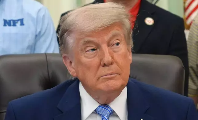 President Donald Trump attends an event about loosening a federal refrigerant rule, in the Oval Office at the White House, Thursday, May 21, 2026, in Washington. (AP Photo/Jacquelyn Martin)