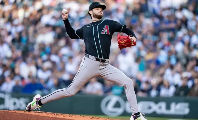 Arizona Diamondbacks starter Ryne Nelson delivers a pitch during the second inning of a baseball game against the Seattle Mariners, Saturday, May 30, 2026, in Seattle. (AP Photo/Stephen Brashear)