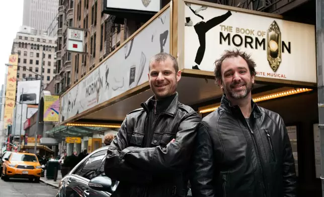FILE - In this March 16, 2011 photo, Trey Parker, right, and Matt Stone, co-creators of the Broadway show "The Book of Mormon," pose for a portrait outside the Eugene O'Neill Theatre in New York. (AP Photo/Victoria Will, file)