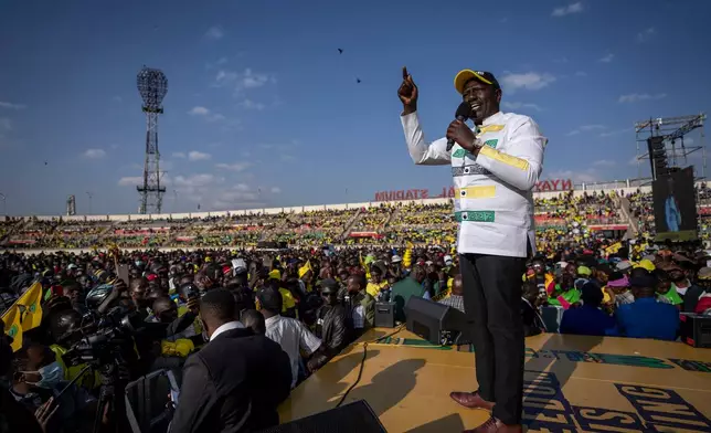 FILE - Kenyan presidential candidate William Ruto addresses supporters at his final electoral campaign rally at Nyayo stadium in Nairobi, Kenya Saturday, Aug. 6, 2022. (AP Photo/Ben Curtis, File)