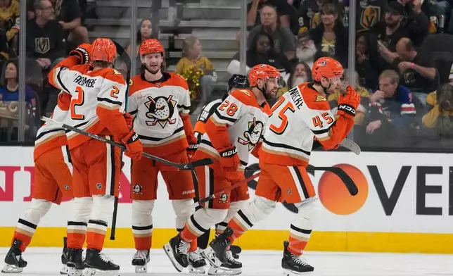 Anaheim Ducks right wing Beckett Sennecke (45) celebrates after scoring against the Vegas Golden Knights during the second period of Game 2 of a second-round NHL hockey Stanley Cup playoff series Wednesday, May 6, 2026, in Las Vegas. (AP Photo/John Locher)