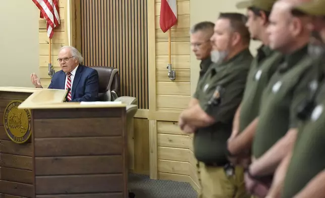 Members of the Cohutta Police Department look on as Mayor Ron Shinnick speaks at Cohutta Town Hall in Cohutta, Ga. on Thursday, April 30, 2026. (Matt Hamilton/Chattanooga Times Free Press via AP)