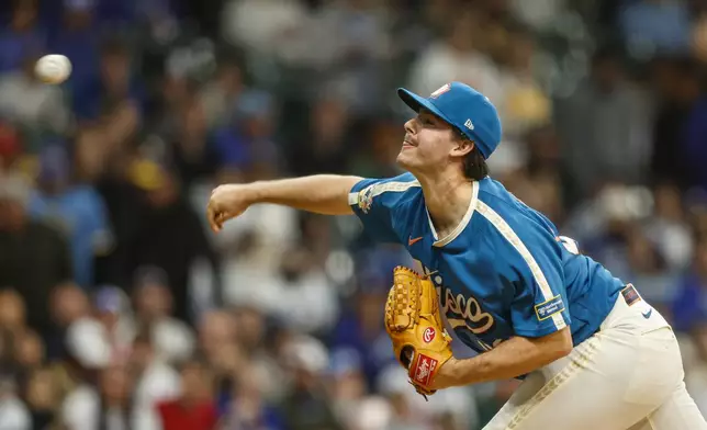 Milwaukee Brewers pitcher Logan Henderson throws to the Los Angeles Dodgers during the first inning of a baseball game, Friday, May 22, 2026, in Milwaukee. (AP Photo/Jeffrey Phelps)