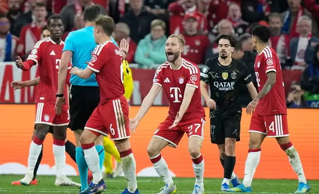 Bayern's Konrad Laimer gestures during the Champions League semifinal second leg soccer match between Bayern Munich and Paris Saint Germain in Munich, Germany, Wednesday, May 6, 2026. (AP Photo/Matthias Schrader)