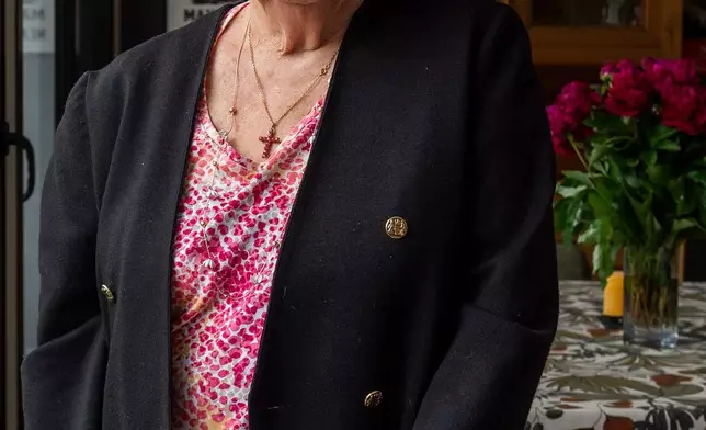 Marie-Therese Ross-Mahe, an 85-year-old French widow of a U.S. military veteran, poses in Orvault, western France, during an interview with The Associated Press as she describes her detention in a Louisiana immigration facility last month, Monday, May 11, 2026. (AP Photo/Mathieu Pattier)