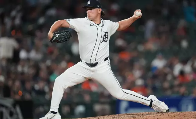 Detroit Tigers pitcher Tyler Holton throws against the Los Angeles Angels during the eighth inning of a baseball game Tuesday, May 26, 2026, in Detroit. (AP Photo/Paul Sancya)