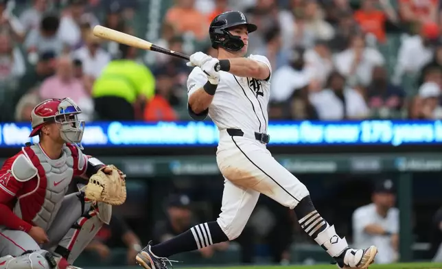 Detroit Tigers' Kevin McGonigle hits a two-run triple against the Los Angeles Angels during the fifth inning of a baseball game Tuesday, May 26, 2026, in Detroit. (AP Photo/Paul Sancya)