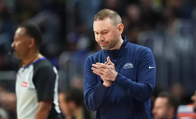 Denver Nuggets head coach David Adelman looks on in the first half in Game 5 of a first-round NBA playoffs basketball series against the Minnesota Timberwolves, Monday, April 27, 2026, in Denver. (AP Photo/David Zalubowski)
