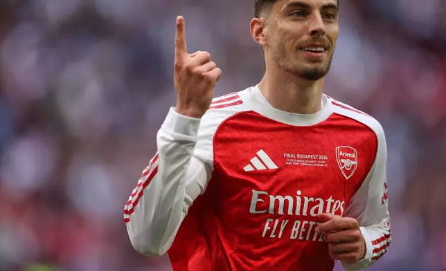 Arsenal's Kai Havertz celebrates after scoring during the Champions League final soccer match between Paris Saint-Germain and Arsenal in Budapest, Hungary, Saturday, May 30, 2026. AP Photo/Armin Durgut)