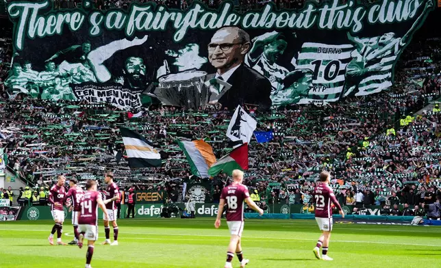 Celtic fans present a tifo featuring manager Martin O'Neill during the Premiership soccer match between Celtic and Heart of Midlothian, in Glasgow, Scotland, Saturday May 16, 2026. (Andrew Milligan//PA via AP)