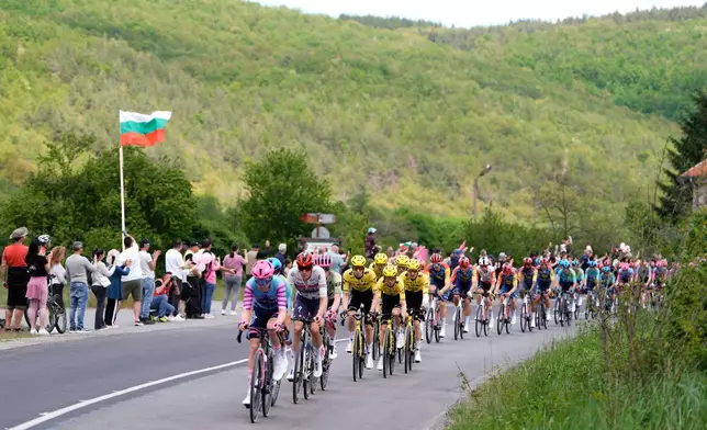 The pack rides during the third stage of the Giro d'Italia cycling race, from Plovdiv to Sofia, Bulgaria, Sunday, May 10, 2026. (Fabio Ferrari/LaPresse via AP)