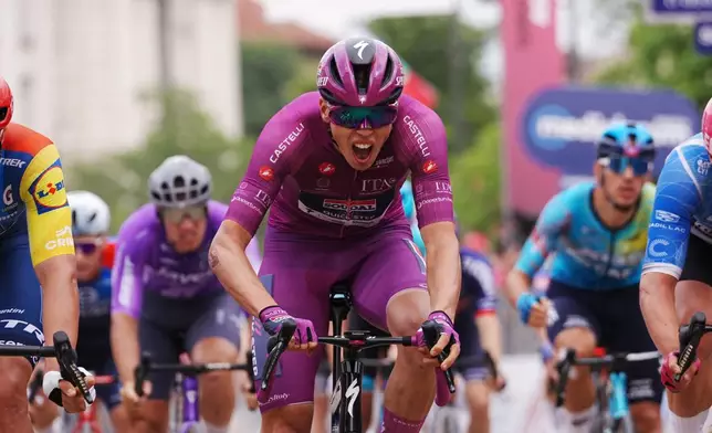 France's Paul Magnier wins the third stage of the Giro d'Italia cycling race, from Plovdiv to Sofia, Bulgaria, Sunday, May 10, 2026. (Gian Mattia d'Alberto/LaPresse via AP)