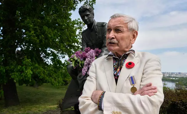 Famous Ukrainian actor Volodymyr Talashko looks on at a monument to pilots to mark Victory Day in World War II, in Kyiv, Ukraine, Tuesday, May 8, 2026, as the Russian attack on Ukraine continues. (AP Photo/Efrem Lukatsky)