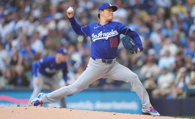 Los Angeles Dodgers pitcher Yoshinobu Yamamoto throws during the second inning of a baseball game against the Milwaukee Brewers, Sunday, May 24, 2026, in Milwaukee. (AP Photo/Kayla Wolf)