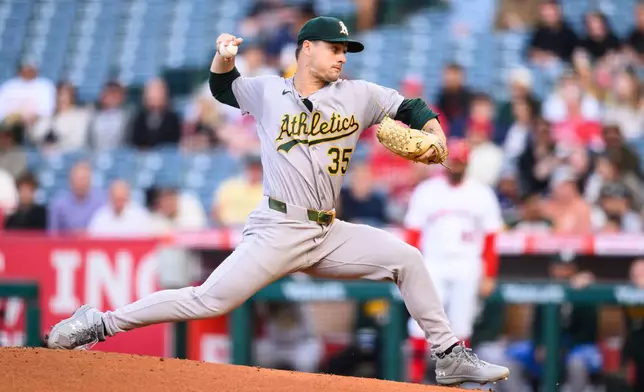 Athletics pitcher J.T. Ginn delivers during the first inning of a baseball game against the Los Angeles Angels, Monday, May 18, 2026, in Anaheim, Calif. (AP Photo/William Liang)