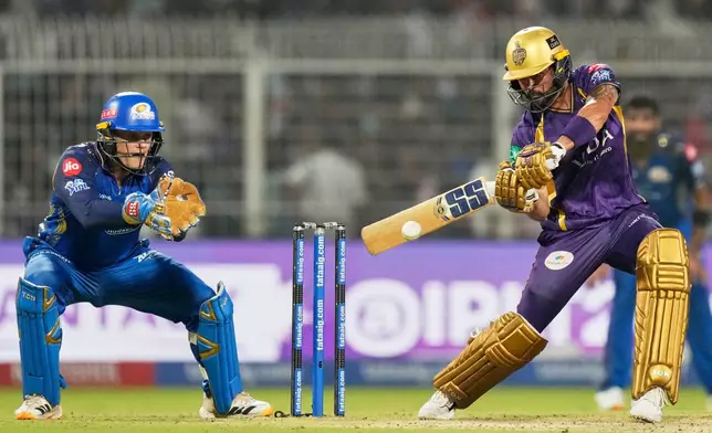 Kolkata Knight Riders' Manish Pandey plays a shot during the Indian Premier League cricket match between Kolkata Knight Riders and Mumbai Indians, in Kolkata , India, Wednesday, May 20, 2026. (AP Photo/Bikas Das)