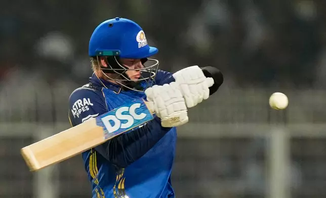 Mumbai Indians' Corbin Bosch plays a shot during the Indian Premier League cricket match between Kolkata Knight Riders and Mumbai Indians, in Kolkata , India, Wednesday, May 20, 2026. (AP Photo/Bikas Das)