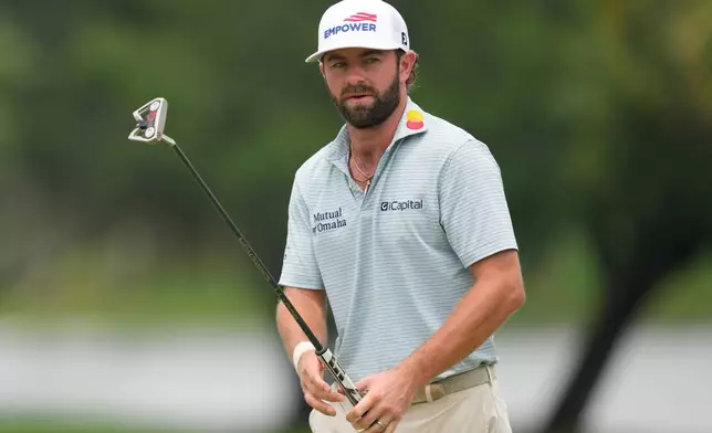 Cameron Young reacts to missing a putt on the sixth hole during the final round of the Cadillac Championship PGA golf tournament Sunday, May 3, 2026, in Doral, Fla. (AP Photo/David J. Phillip)