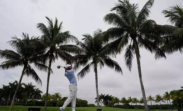 Scottie Scheffler hits off the second tee during the final round of the Cadillac Championship PGA golf tournament Sunday, May 3, 2026, in Doral, Fla. (AP Photo/David J. Phillip)