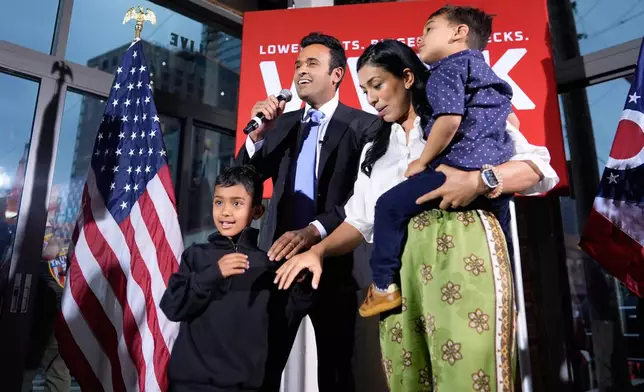 Republican Ohio gubernatorial candidate Vivek Ramaswamy, alongside his sons, Karthik and Arjun, and his wife, Apoorva Ramaswamy, speaks during a watch party at the Spruce St. Sporting sports bar after winning the party?s nomination for governor Tuesday, May 5, 2026, in Columbus. (AP Photo/Carolyn Kaster)