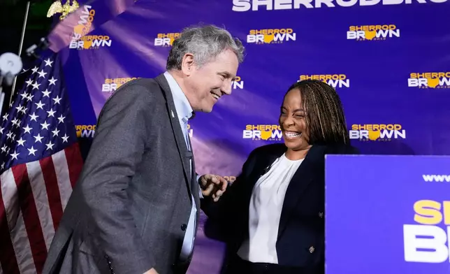 Democratic Ohio Senate candidate Sherrod Brown, a former three-term U.S. senator, left, shares a laugh with Rep. Shontel Brown, D-Ohio, at a primary election night campaign event after Brown won the party's primary for Senate in Cleveland, Tuesday, May 5, 2026. (AP Photo/Sue Ogrocki)