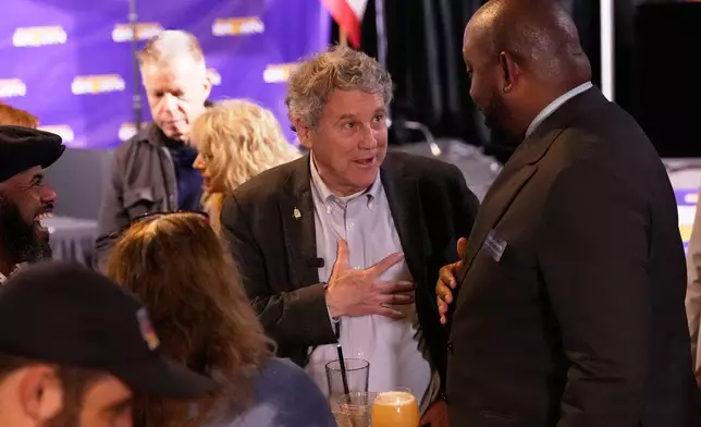 Democratic Ohio Senate candidate Sherrod Brown, a former three-term U.S. senator, speaks with attendees at a primary election night campaign event after winning the party's primary for US Senate in Cleveland, Tuesday, May 5, 2026. (AP Photo/Sue Ogrocki)