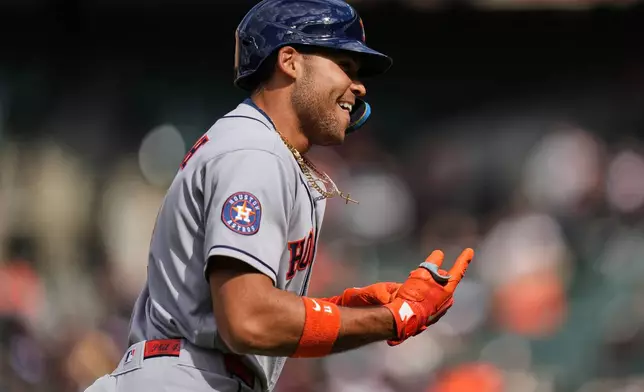 Houston Astros' Cam Smith rounds the bases after hitting a three-run home run during the first inning in the second baseball game of a doubleheader against the Baltimore Orioles, Thursday, April 30, 2026, in Baltimore. (AP Photo/Stephanie Scarbrough)