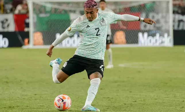 FILE _ Mexico's Julian Araujo (2) plays the ball during the first half of a CONCACAF Gold Cup soccer match against Haiti Thursday, June 29, 2023, in Glendale, Ariz. (AP Photo/Darryl Webb, File)