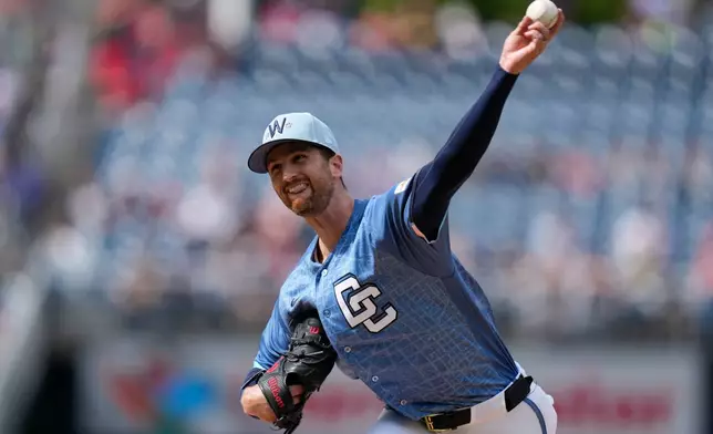 Washington Nationals starting pitcher Foster Griffin throws to the Milwaukee Brewers during the first inning of a baseball game, Saturday, May 2, 2026, in Washington. (AP Photo/Jess Rapfogel)