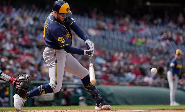 Milwaukee Brewers' Brandon Lockridge hits a two-RBI single against the Washington Nationals during the first inning of a baseball game, Saturday, May 2, 2026, in Washington. (AP Photo/Jess Rapfogel)