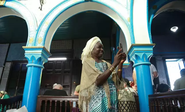 Jewish pilgrims attend an annual pilgrimage at the Ghriba synagogue in the resort of Djerba, Tunisia, on Monday, May 4, 2026. (AP Photo/Bassem Aouini)