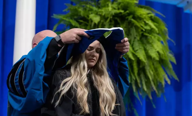 Erika Kirk hooding.