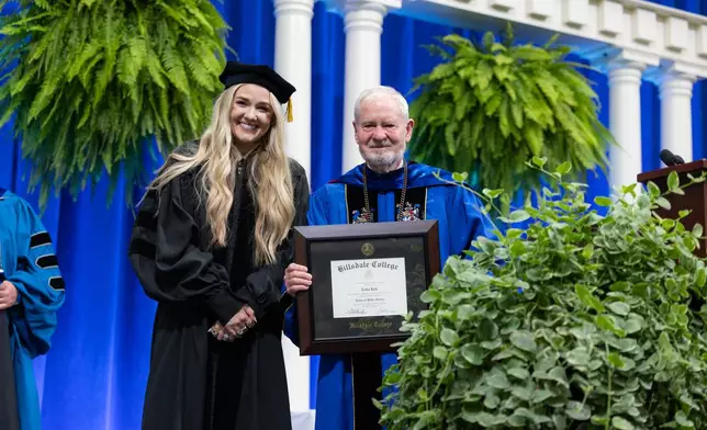 Erika Kirk and Hillsdale College President Larry P. Arnn with Honorary Degree.