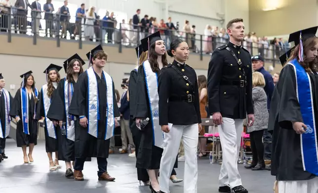Students processing into ceremony.