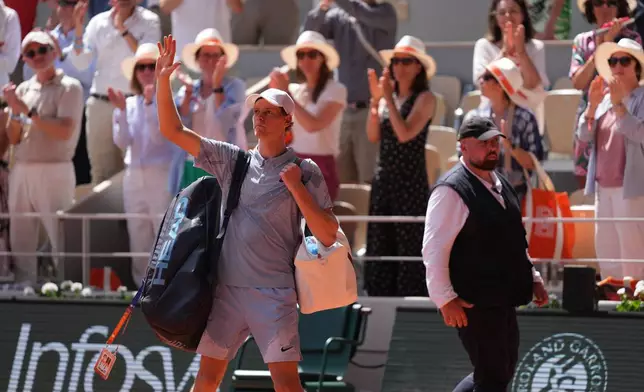 Jannik Sinner of Italy waves as he leaves the court after the second round men's singles tennis match against Juan Manuel Cerundolo of Argentina at the French Open tennis tournament in Paris, Thursday, May 28, 2026. (AP Photo/Thibault Camus)