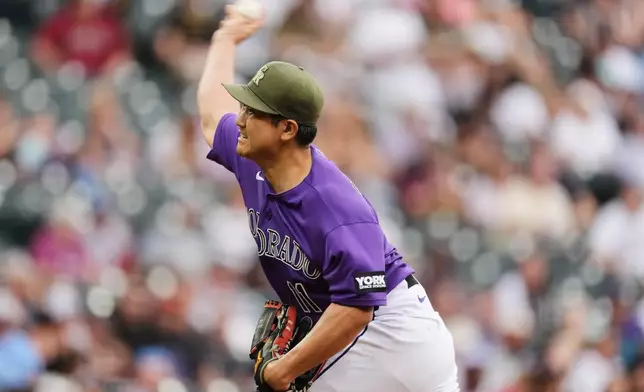 Colorado Rockies starting pitcher Tomoyuki Sugano works against the Arizona Diamondbacks in the first inning of a baseball game, Saturday, May 16, 2026, in Denver. (AP Photo/David Zalubowski)